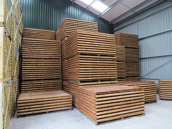 Traditional Waney Lap Fence Panels in our Warehouse Storage Facility